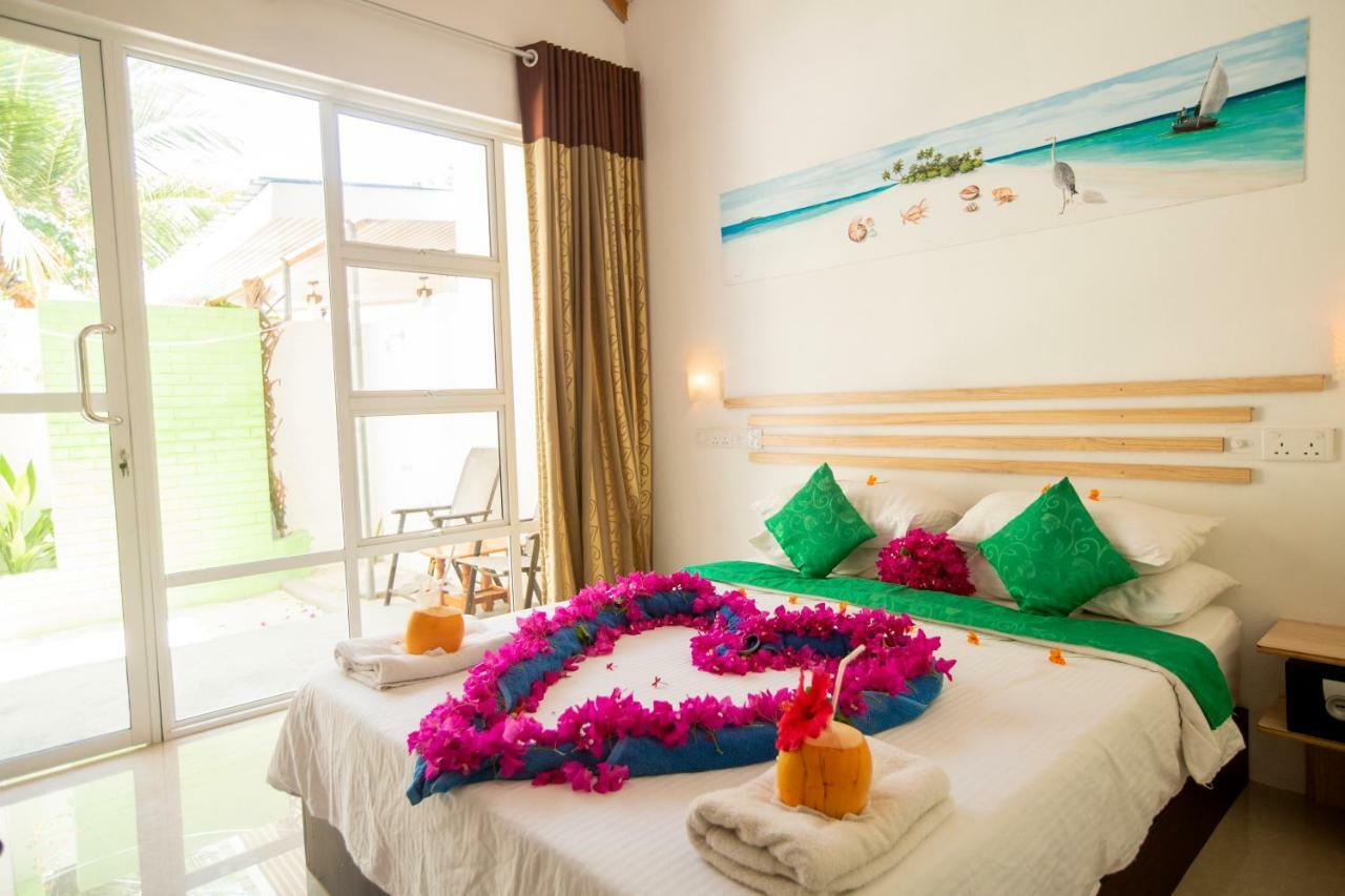 Palm Garden Hotel Thoddoo Buitenkant foto